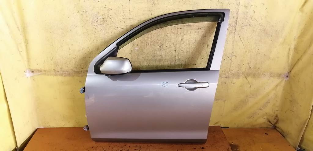 дверь Mazda Demio