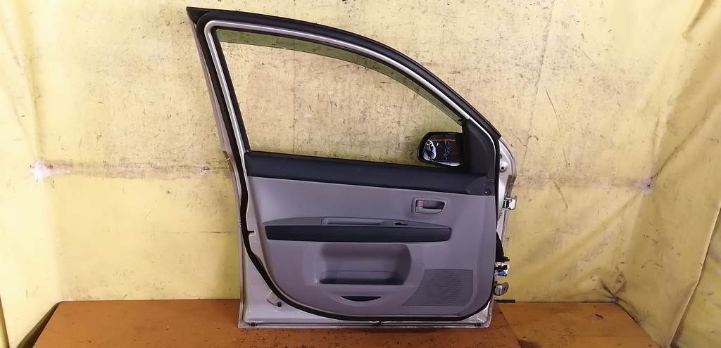 дверь Mazda Demio