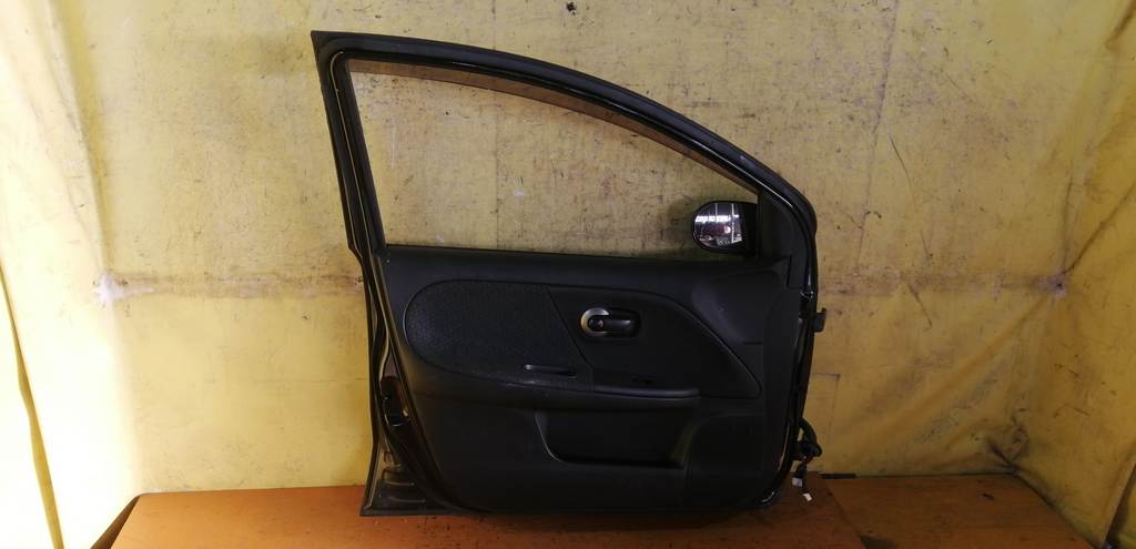 дверь Nissan Note