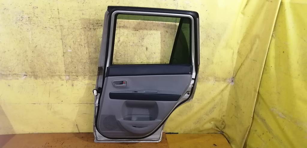 дверь Mazda Demio