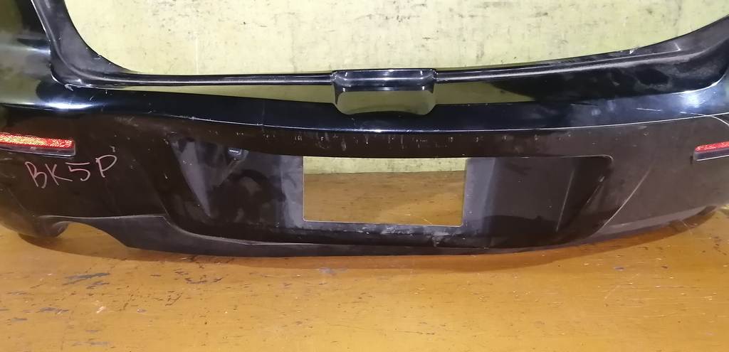 бампер Mazda Axela