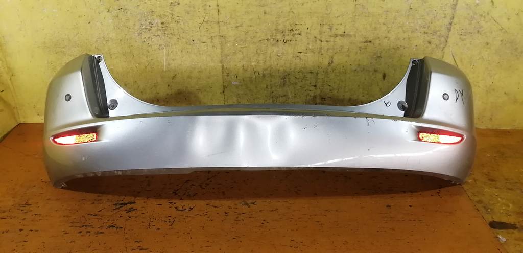 бампер Mazda Demio