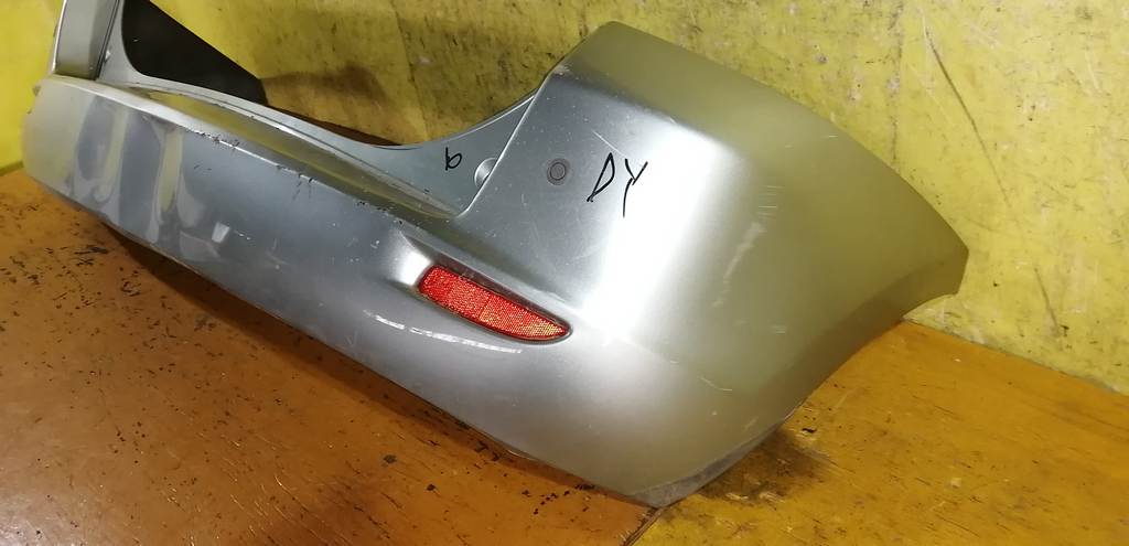 бампер Mazda Demio