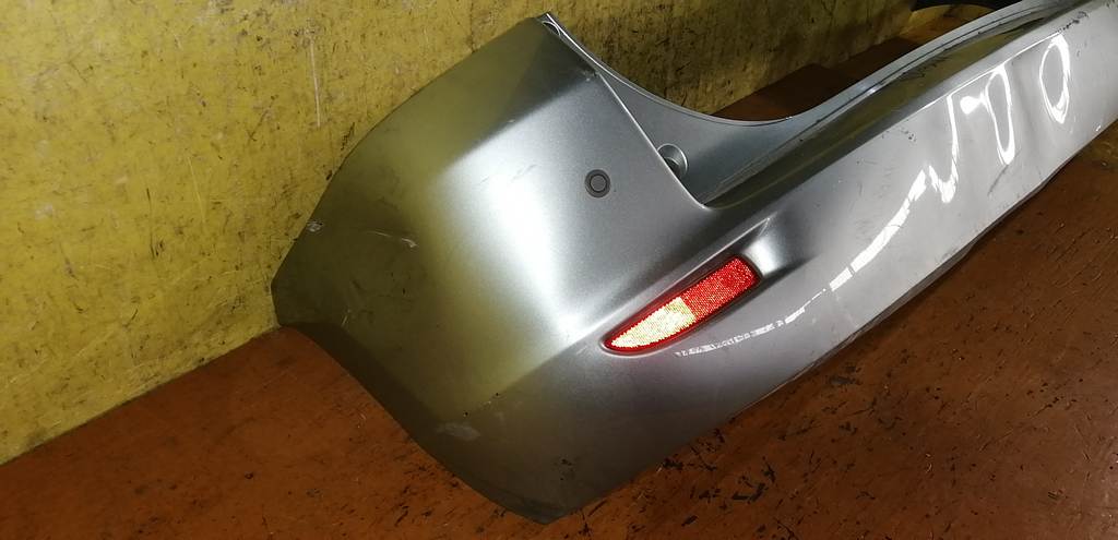 бампер Mazda Demio