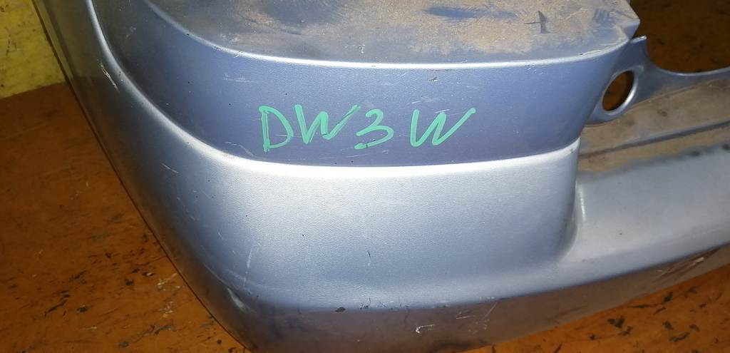 бампер Mazda Demio