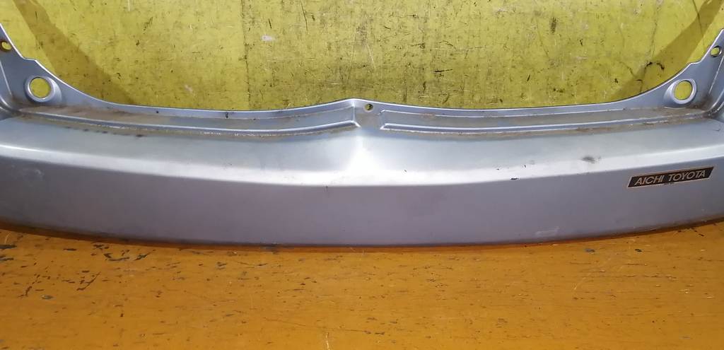 бампер Mazda Demio