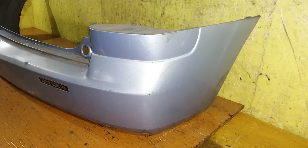 бампер Mazda Demio