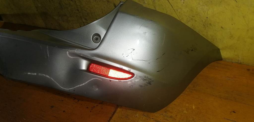 бампер Mazda Demio