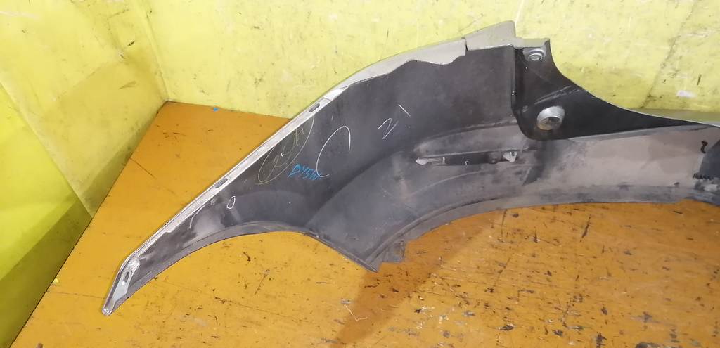 бампер Mazda Demio