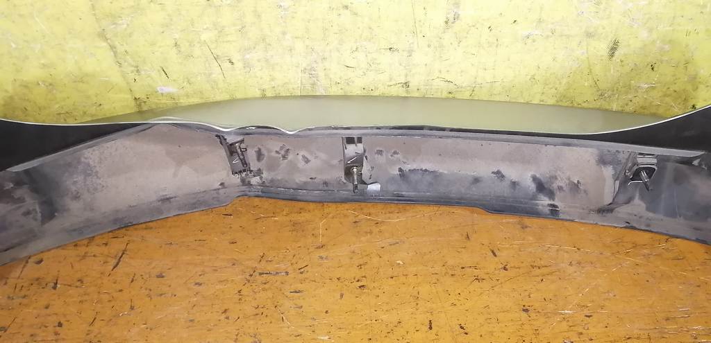 бампер Mazda Demio