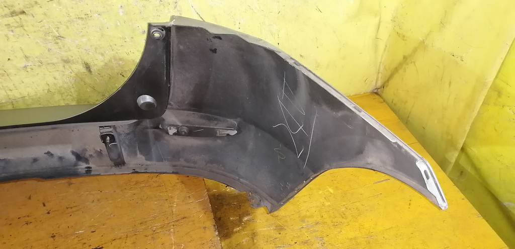 бампер Mazda Demio