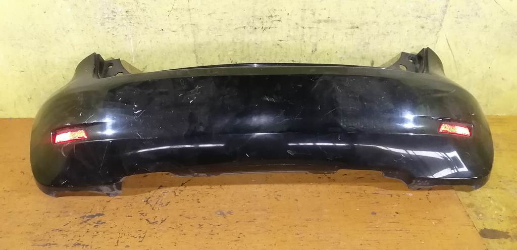 бампер Nissan Note