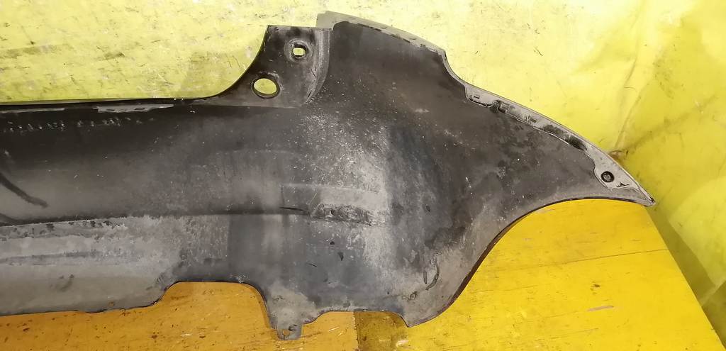 бампер Nissan Note