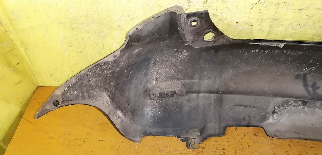 бампер Nissan Note