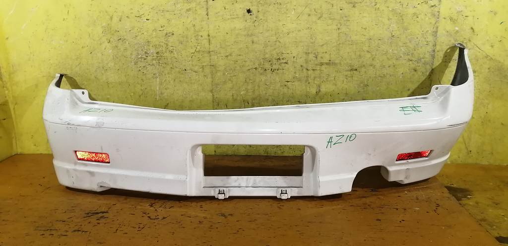 бампер Nissan Cube