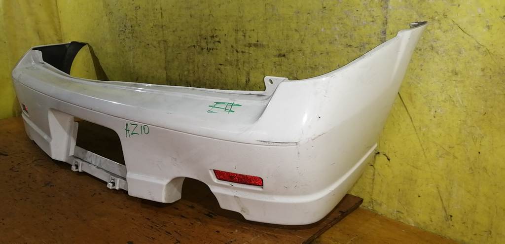 бампер Nissan Cube