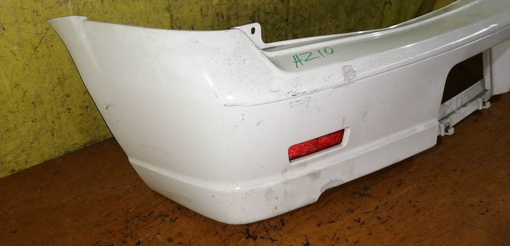 бампер Nissan Cube