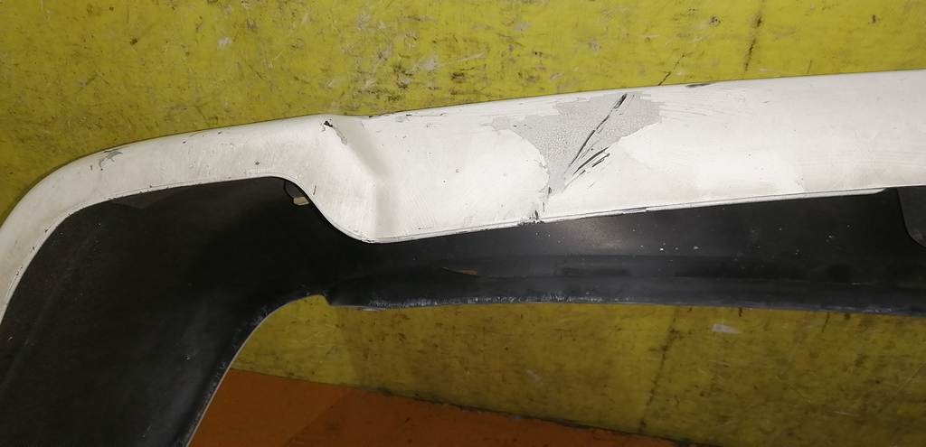 бампер Nissan Cube