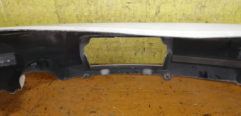 бампер Nissan Cube