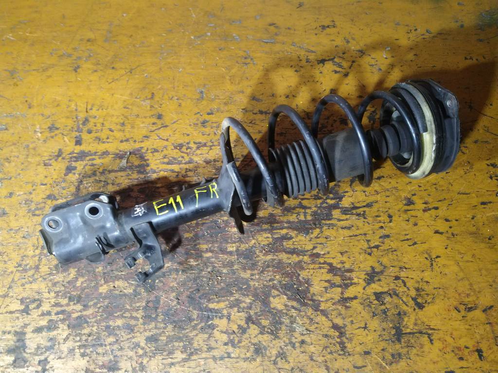 стойка Nissan Note