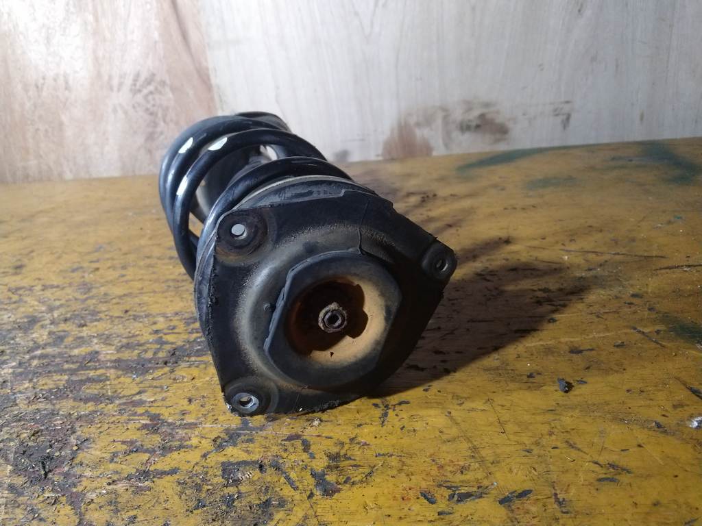 стойка Nissan Note