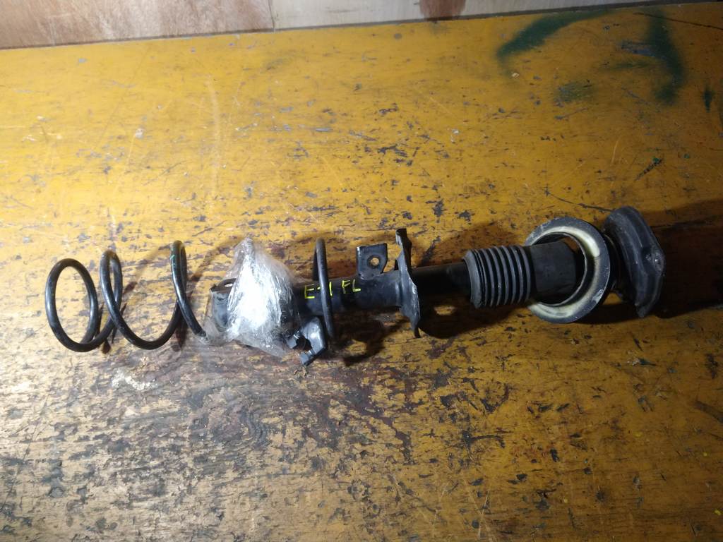 стойка Nissan Note