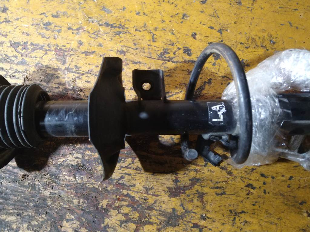 стойка Nissan Note