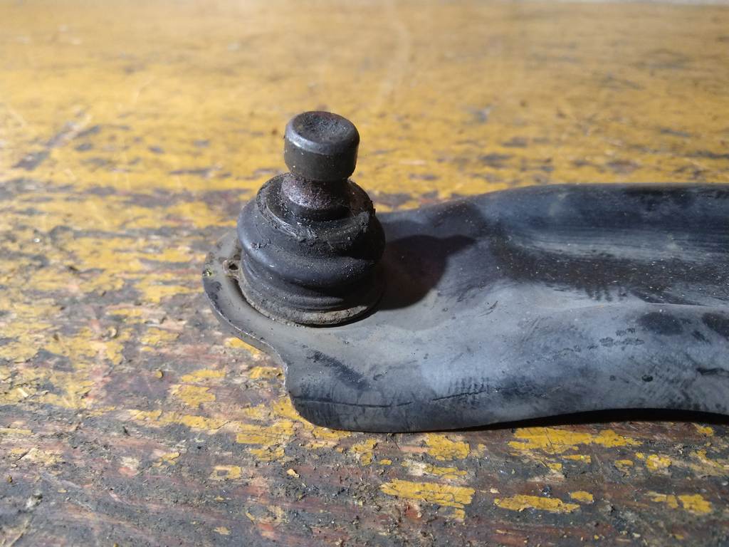 рычаг Nissan March