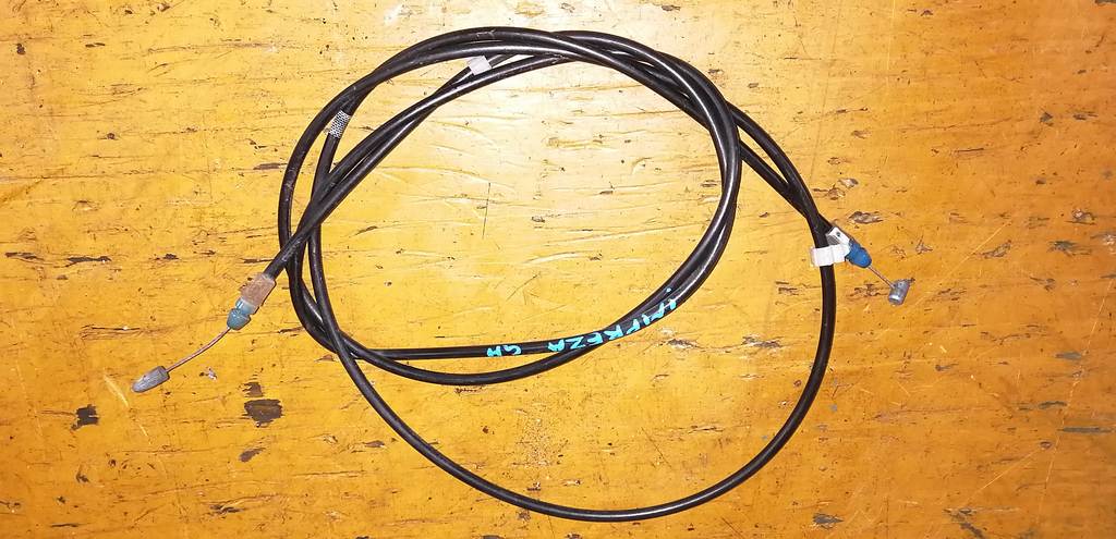 трос капота Subaru Impreza