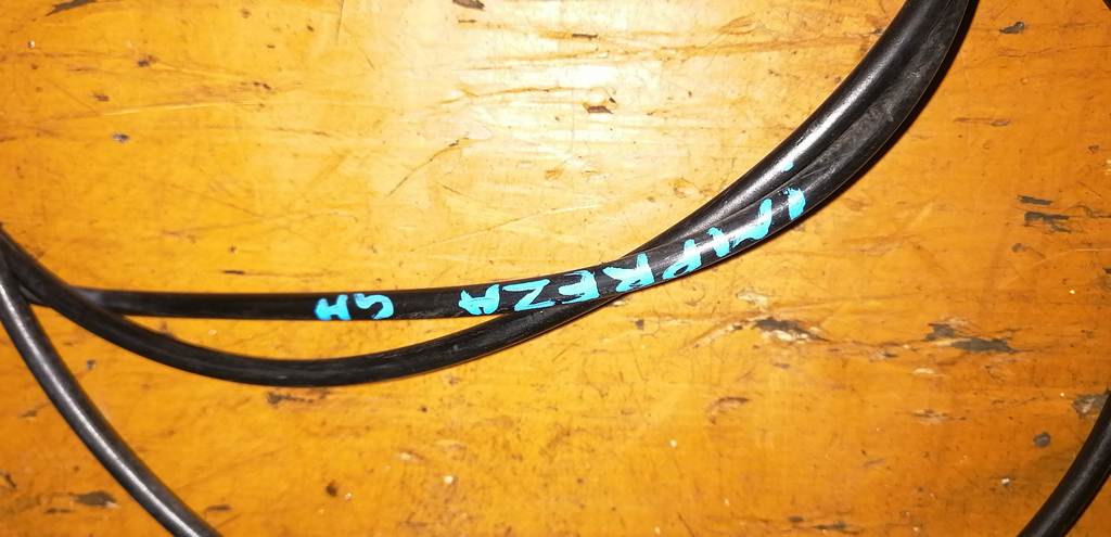 трос капота Subaru Impreza