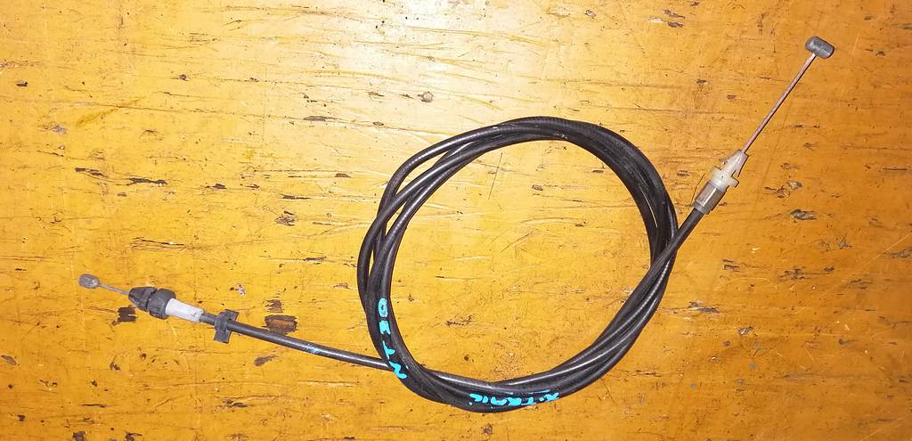 трос капота Nissan X-Trail