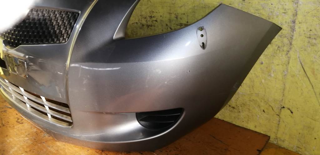 бампер Toyota Vitz