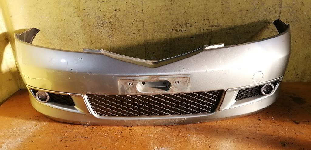 бампер Mazda Demio
