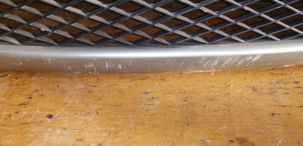 бампер Mazda Demio