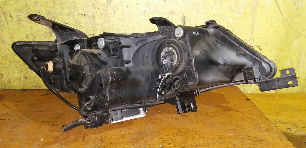 фара Mitsubishi Outlander