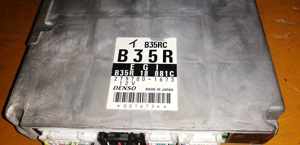 блок управления двс Mazda Demio