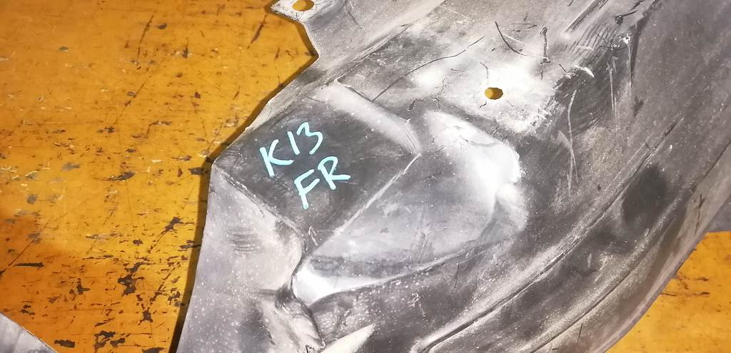 подкрылок Nissan March