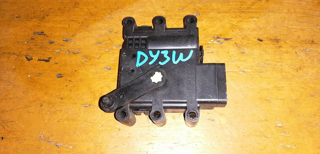 сервопривод заслонок печки Mazda Demio