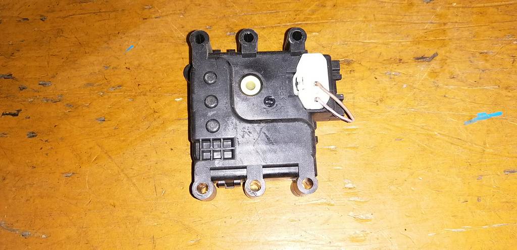 сервопривод заслонок печки Mazda Demio