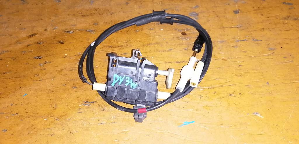 трос замка зажигания   Mazda Demio