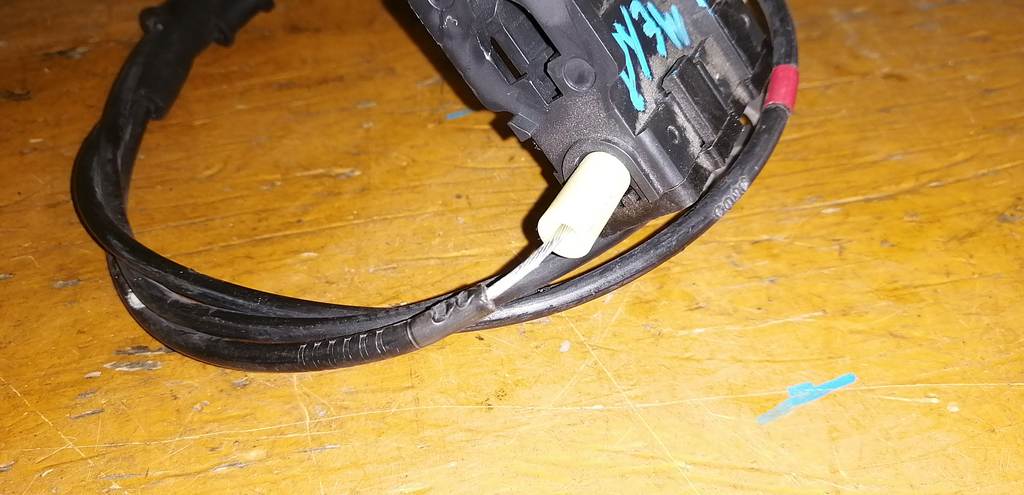 трос замка зажигания   Mazda Demio