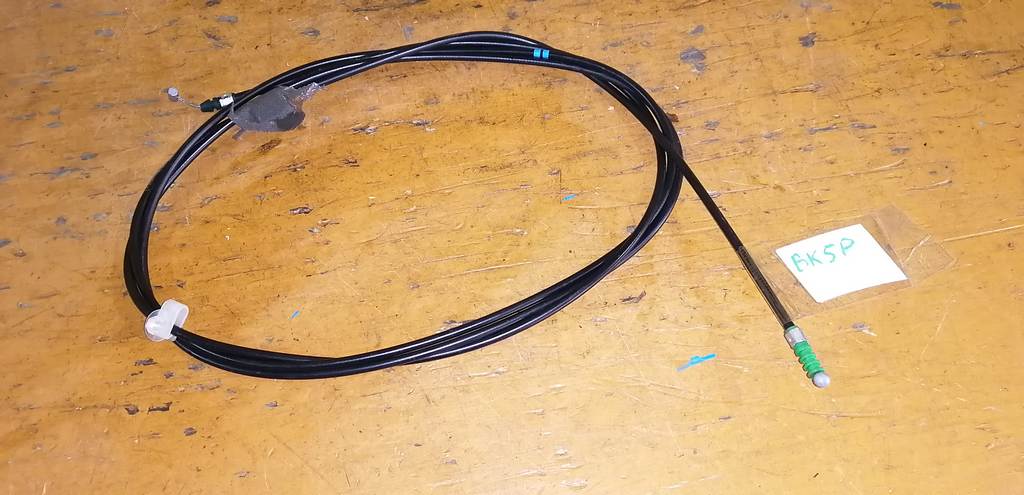 тросик багажника Mazda Axela