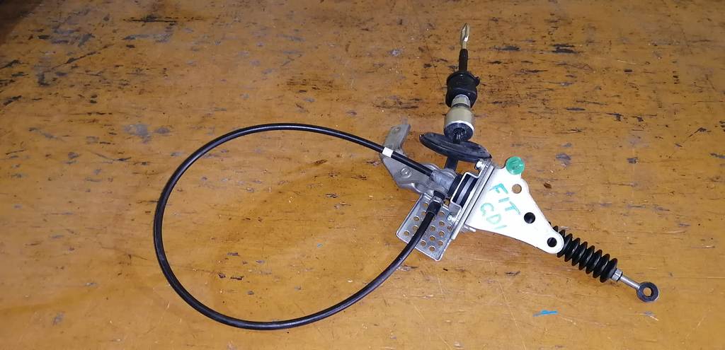 трос переключения акпп Honda Fit