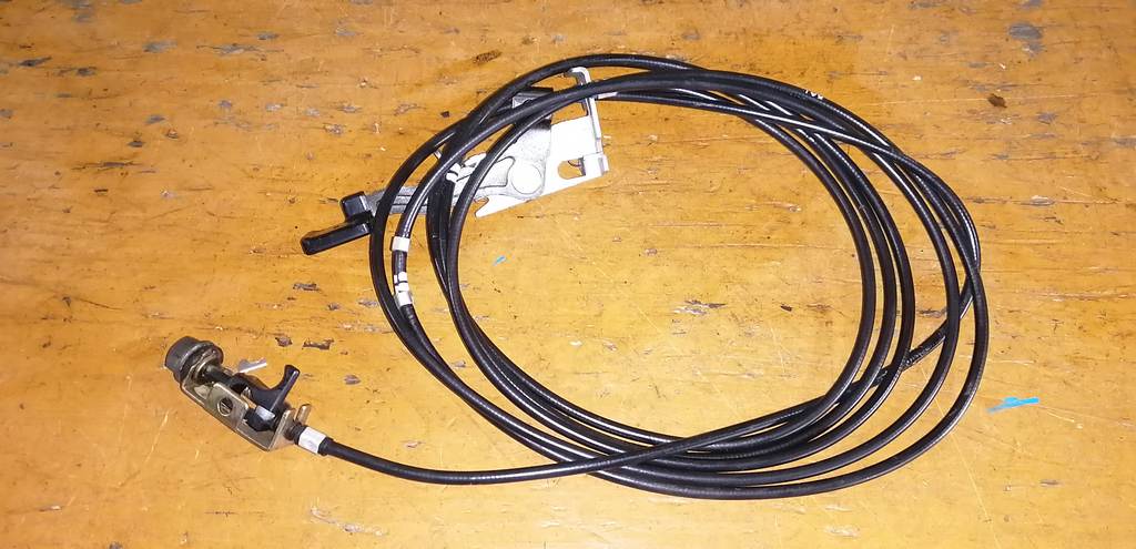 тросик лючка бака Mazda Demio