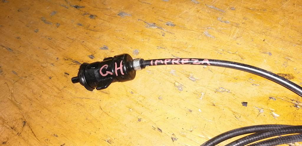 тросик лючка бака Subaru Impreza