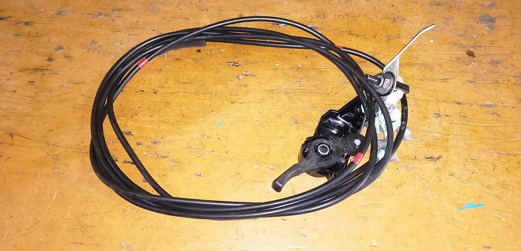 тросик лючка бака Toyota Passo