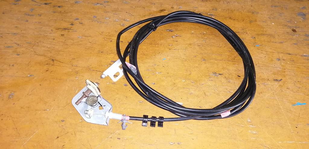 тросик лючка бака Nissan X-Trail