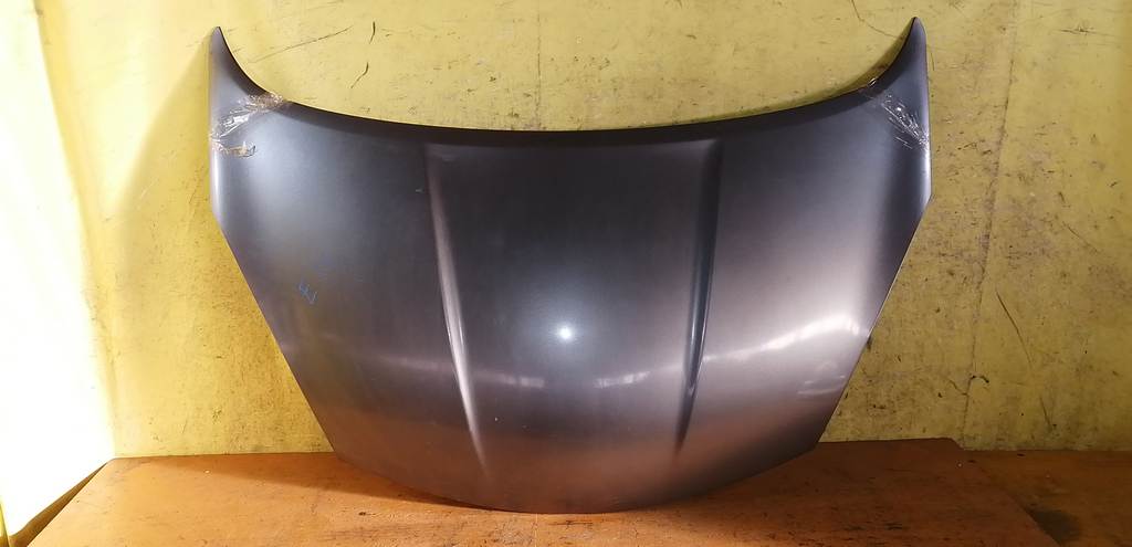 капот Nissan Note