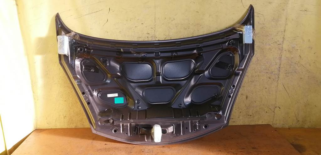 капот Nissan Note