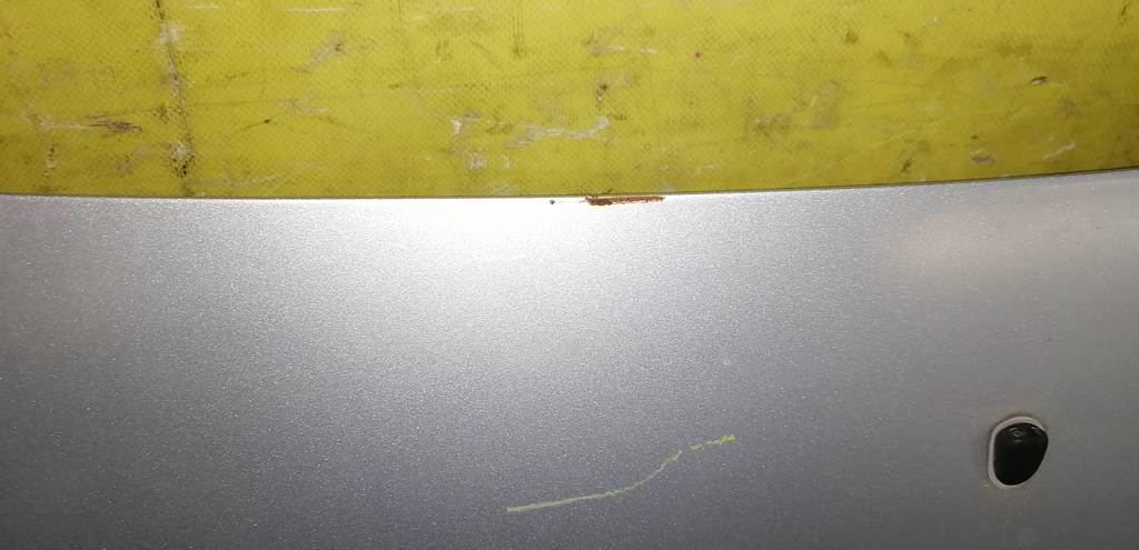 капот Mazda Demio